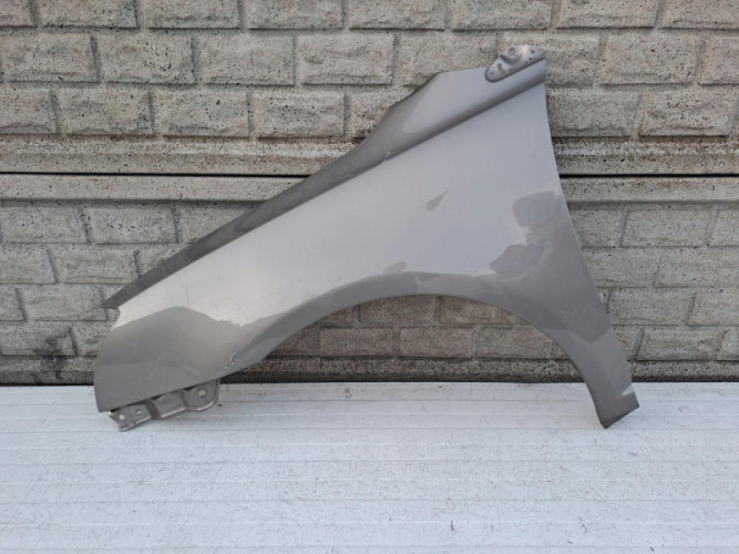TOYOTA AVENSIS T25 2003-2006 BŁOTNIK PRZEDNI LEWY - (13251272050)