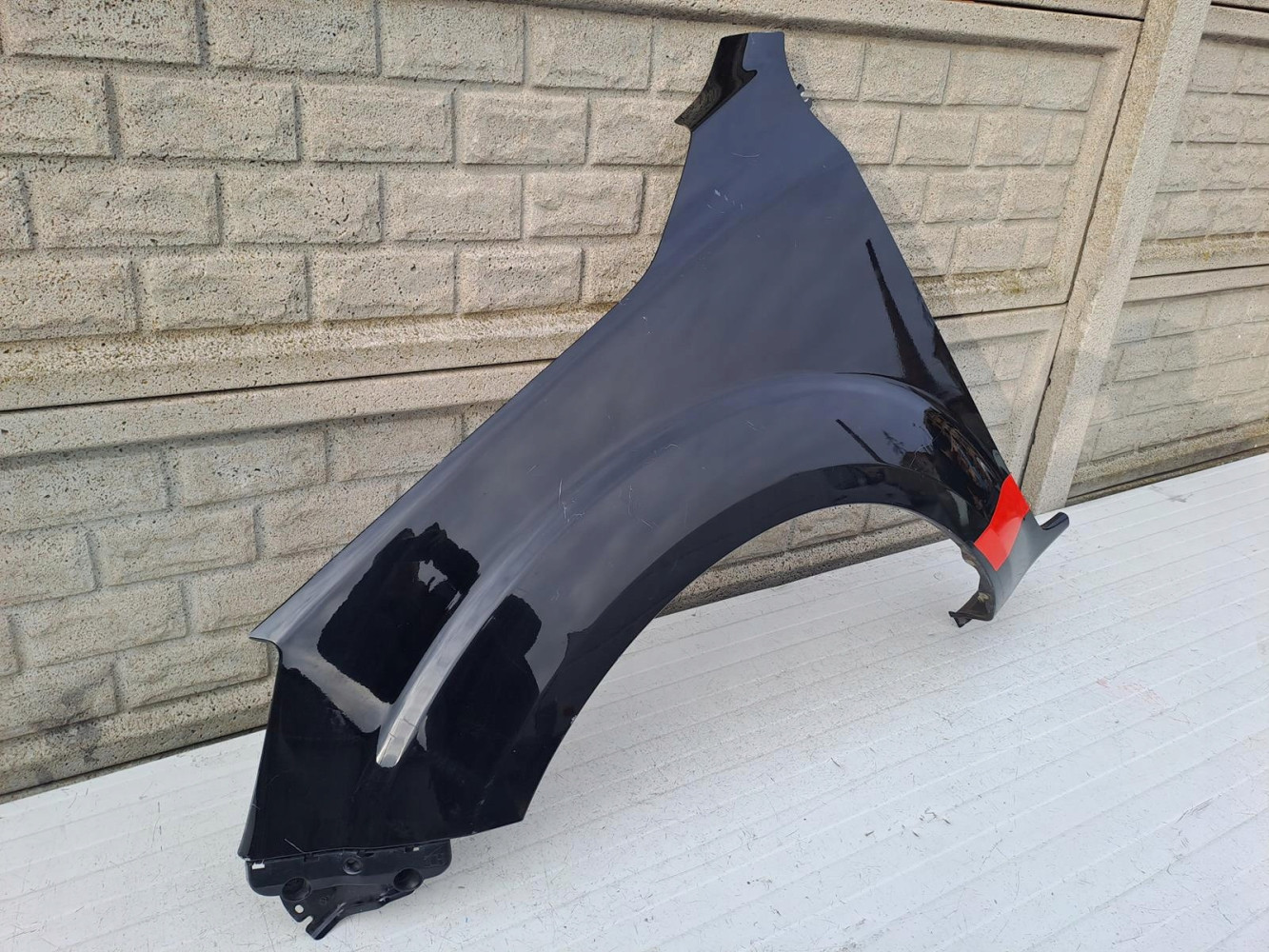 NISSAN NAVARA IV 16-22 BŁOTNIK PRZEDNI LEWY - (13258054386)