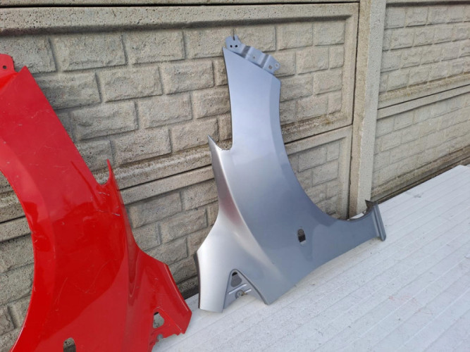 MAZDA 2 II 2007-2015 BŁOTNIK LEWY PRAWY PRZEDNI - (13322255878)