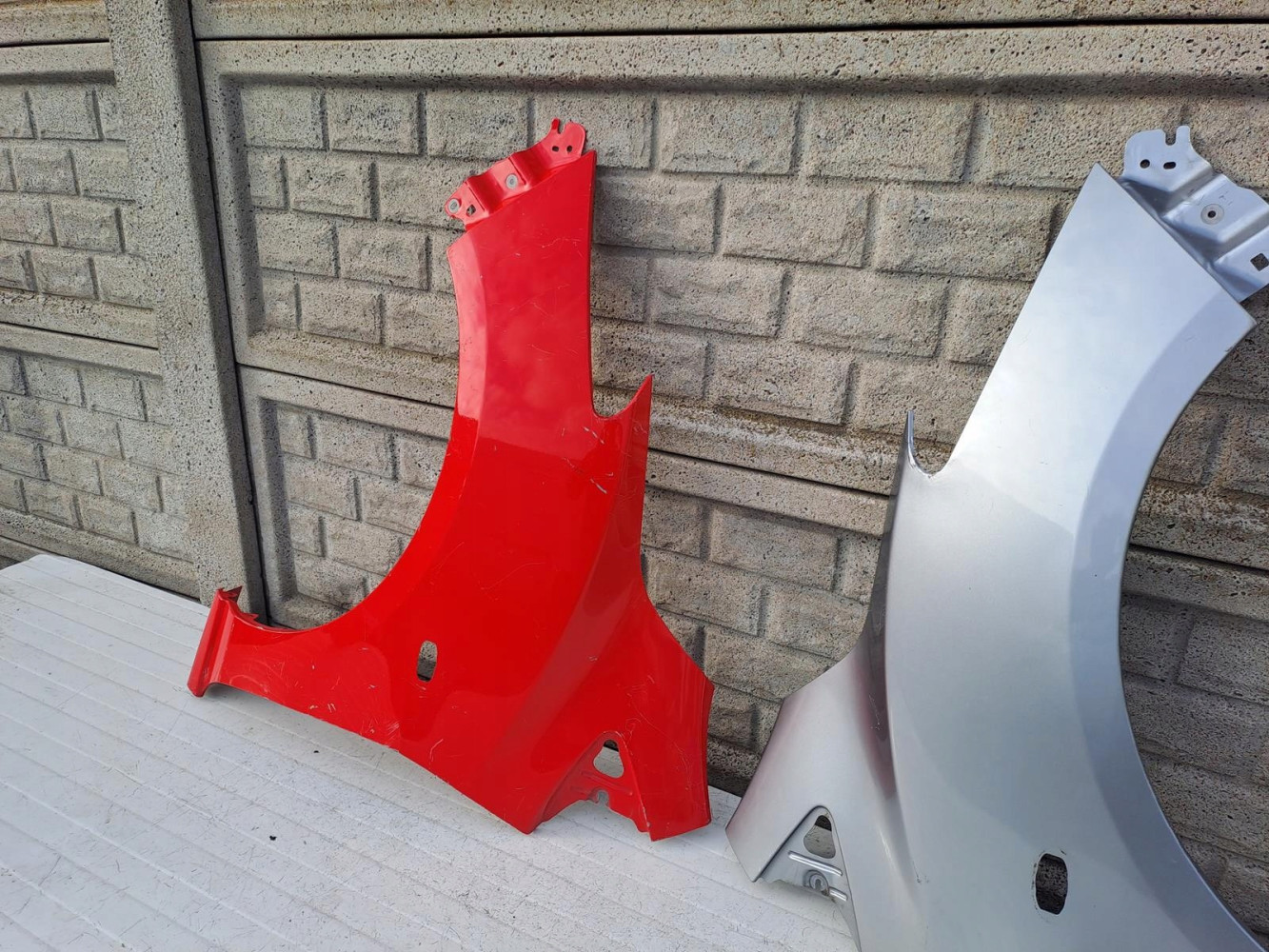 MAZDA 2 II 2007-2015 BŁOTNIK LEWY PRAWY PRZEDNI - (13322255878)