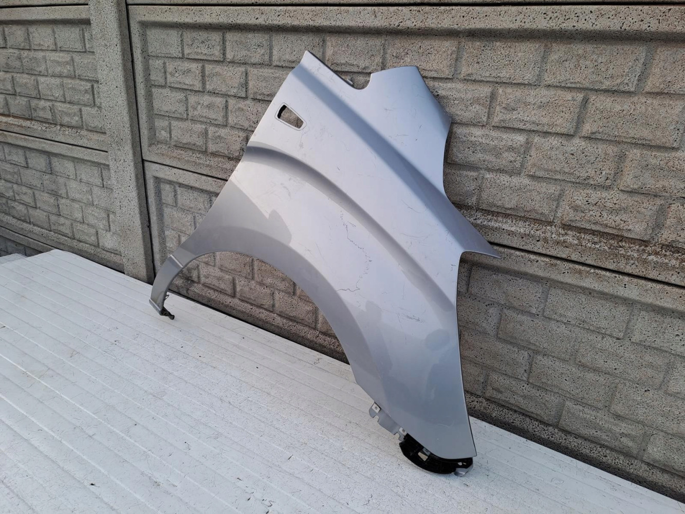 HYUNDAI H1 2007- BŁOTNIK PRZEDNI PRAWY - (13356034232)