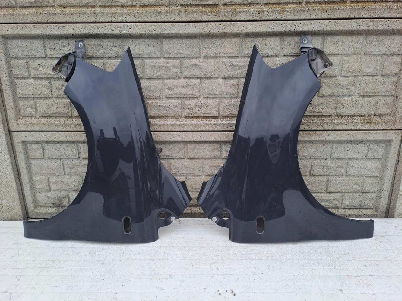 VW FOX 05-09 BŁOTNIK PRZEDNI PRAWY LEWY - (13386465049)