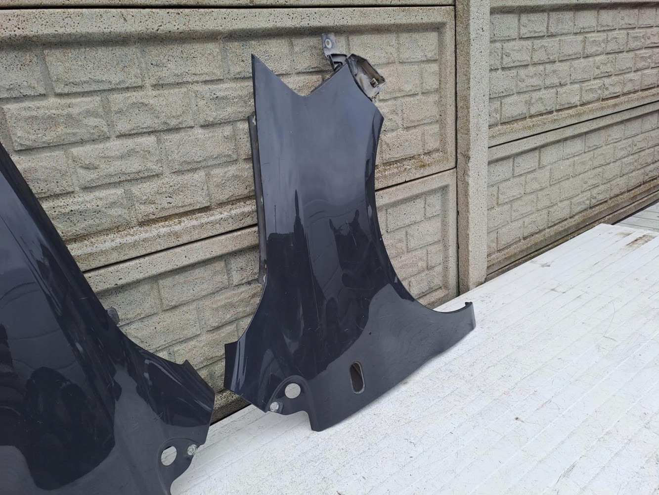 VW FOX 05-09 BŁOTNIK PRZEDNI PRAWY LEWY - (13386465049)