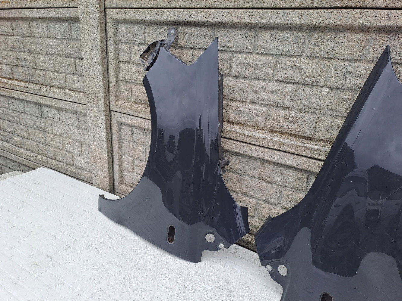 VW FOX 05-09 BŁOTNIK PRZEDNI PRAWY LEWY - (13386465049)