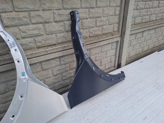 HYUNDAI IONIQ V 21-23 BŁOTNIK PRAWY LEWY PRZEDNI - (13386518587)