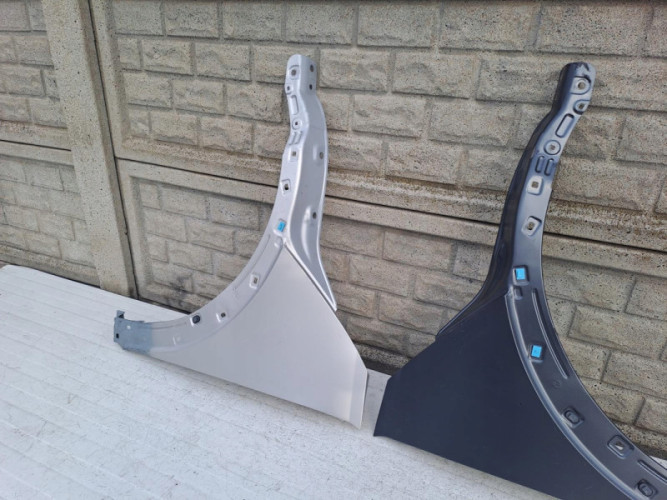 HYUNDAI IONIQ V 21-23 BŁOTNIK PRAWY LEWY PRZEDNI - (13386518587)