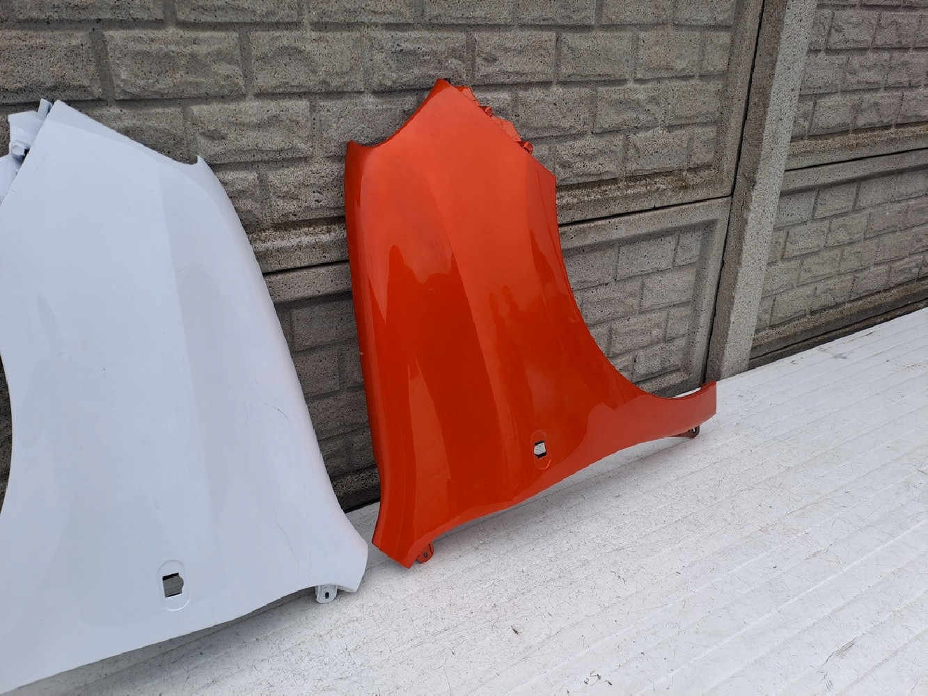 RENAULT TWINGO 3 14-23 BŁOTNIK PRZEDNI PRAWY LEWY - (13423881337)