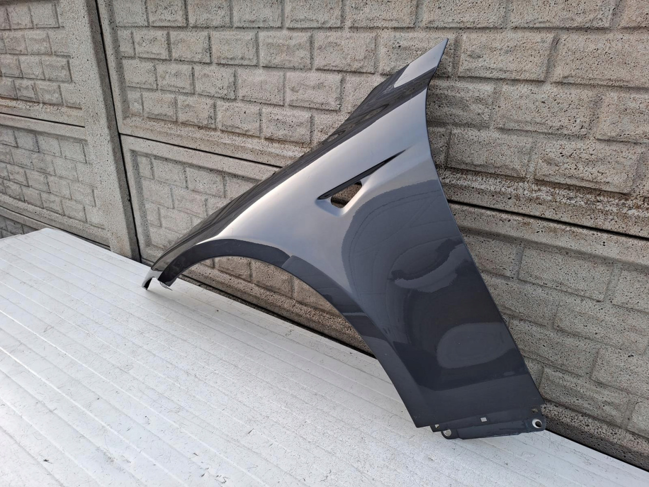 TESLA MODEL S BŁOTNIK LEWY PRZEDNI - (13437804946)