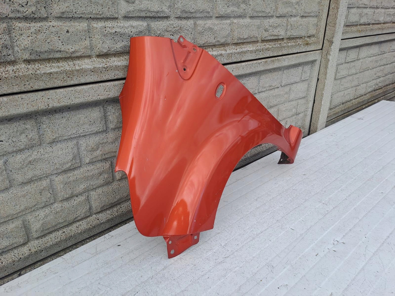 TOYOTA AYGO I 1 2005-2012 BŁOTNIK LEWY PRZEDNI - (13533546402)