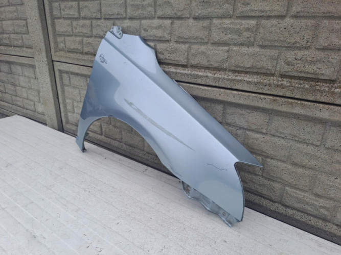 BŁOTNIK PRAWY TOYOTA AVENSIS LIFT T25 2006 - 2009 - (13557875570)