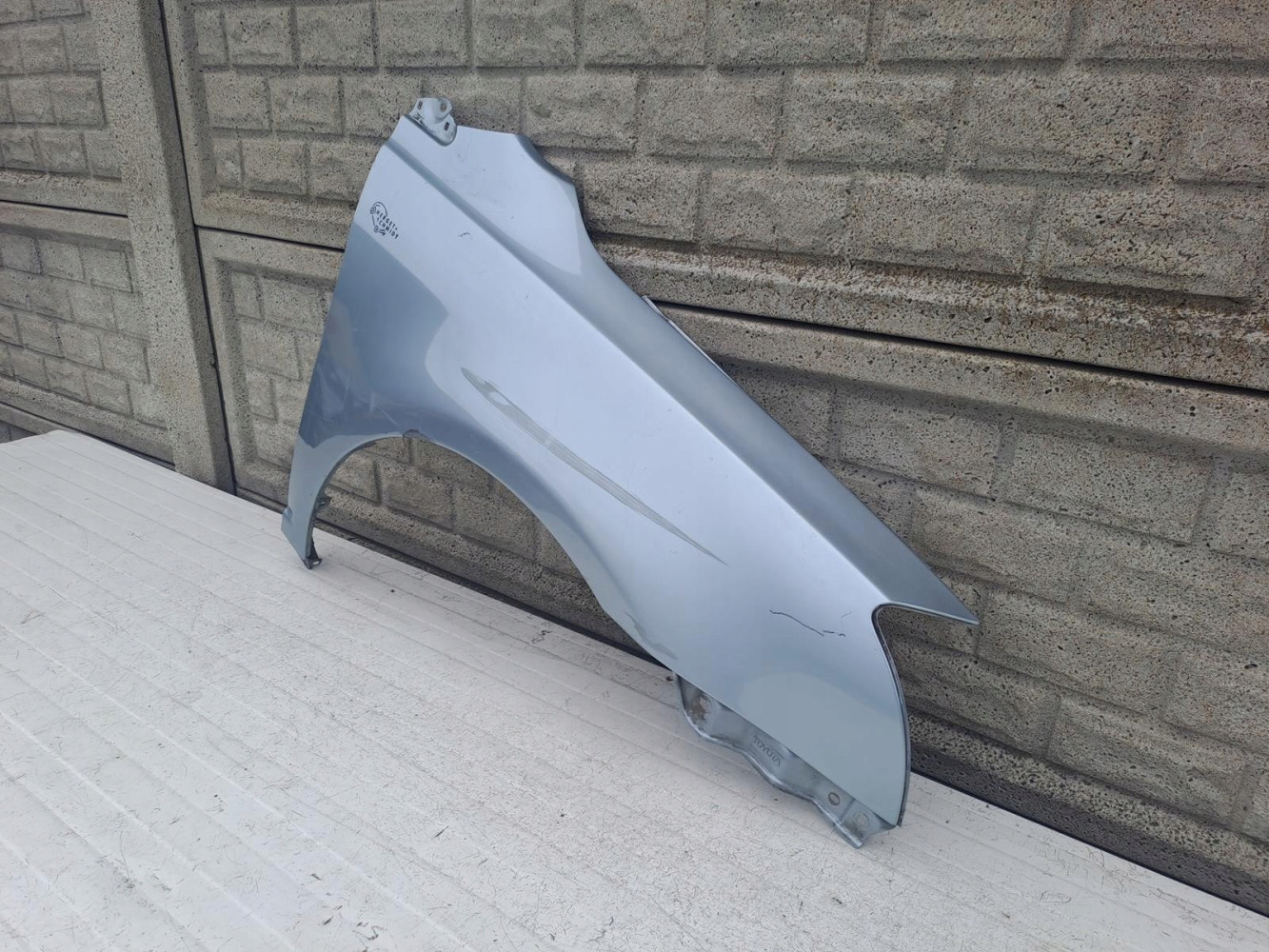 BŁOTNIK PRAWY TOYOTA AVENSIS LIFT T25 2006 - 2009 - (13557875570)