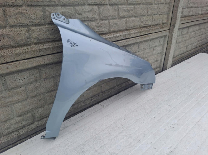BŁOTNIK PRAWY TOYOTA AVENSIS LIFT T25 2006 - 2009 - (13557875570)
