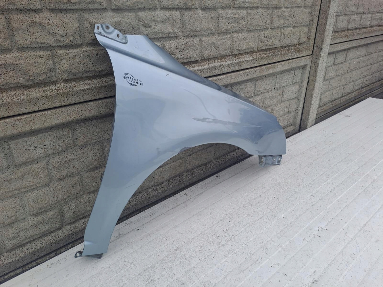 BŁOTNIK PRAWY TOYOTA AVENSIS LIFT T25 2006 - 2009 - (13557875570)