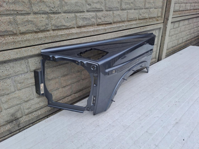MERCEDES G KLASA W463 W464 BŁOTNIK LEWY PRZEDNI - (13557948887)