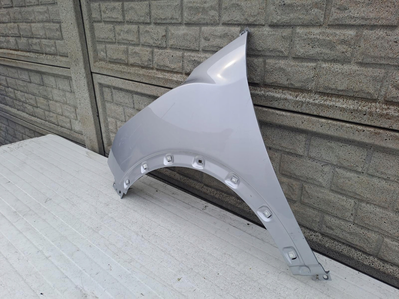 SSANGYONG TIVOLI LIFT 19- BŁOTNIK LEWY PRZEDNI - (13569523214)