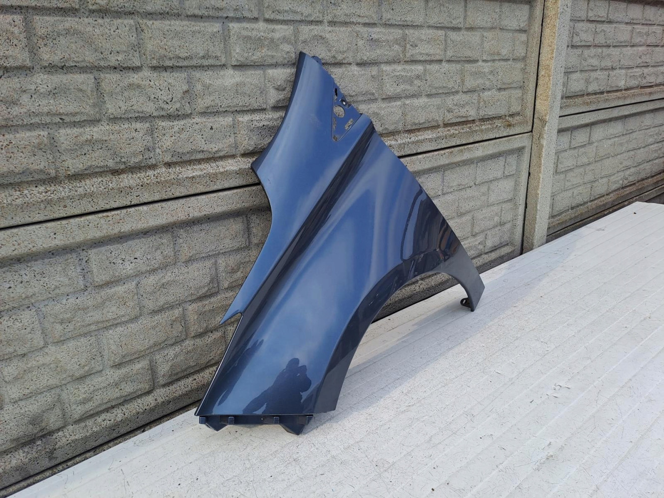 RENAULT ZOE BŁOTNIK PRZEDNI LEWY - (13584742531)