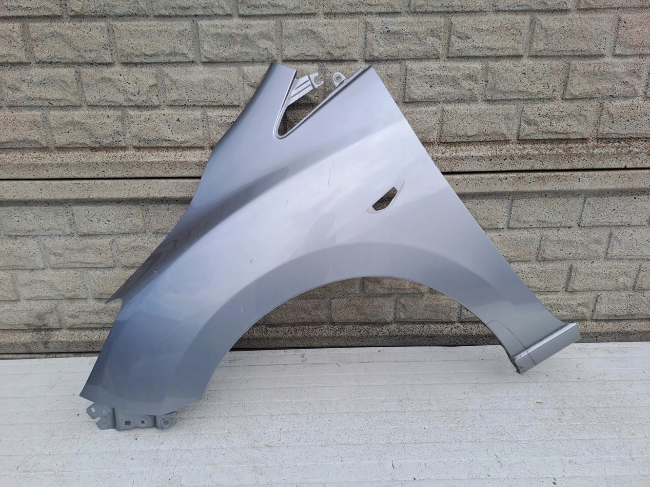 MAZDA 5 V 10-18 BŁOTNIK PRZEDNI LEWY - (13617874997)