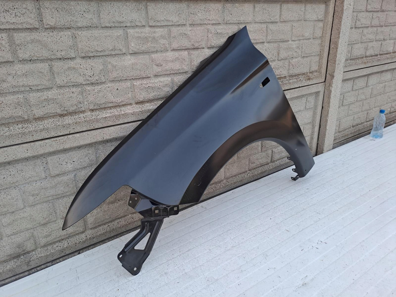 MITSUBISHI OUTLANDER 13-20 LIFT BŁOTNIK LEWY NOWY - (13779384833)