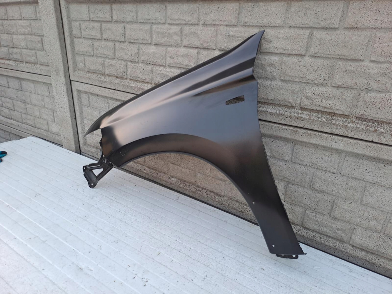MITSUBISHI OUTLANDER 13-20 LIFT BŁOTNIK LEWY NOWY - (13779384833)