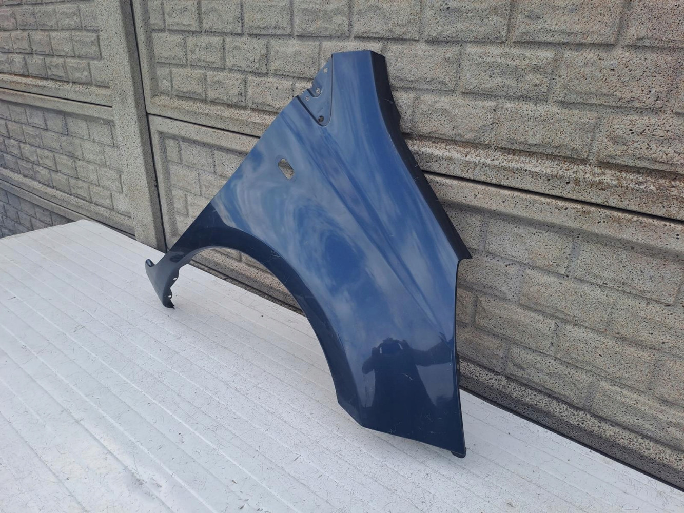 NISSAN NOTE 2006 - 2012 BŁOTNIK PRZEDNI PRAWY - (13814785390)