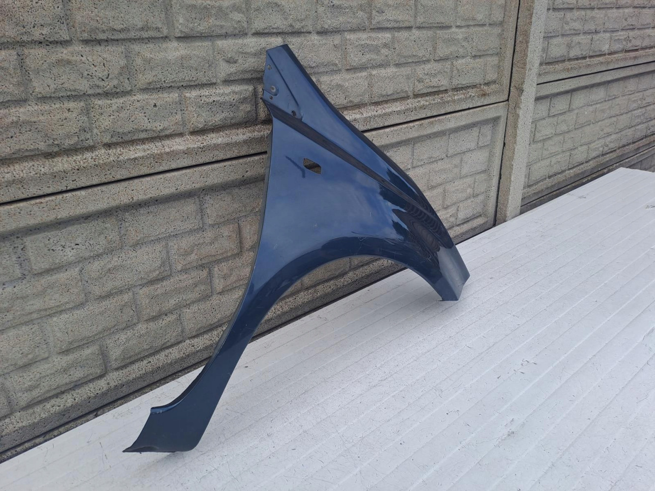 NISSAN NOTE 2006 - 2012 BŁOTNIK PRZEDNI PRAWY - (13814785390)