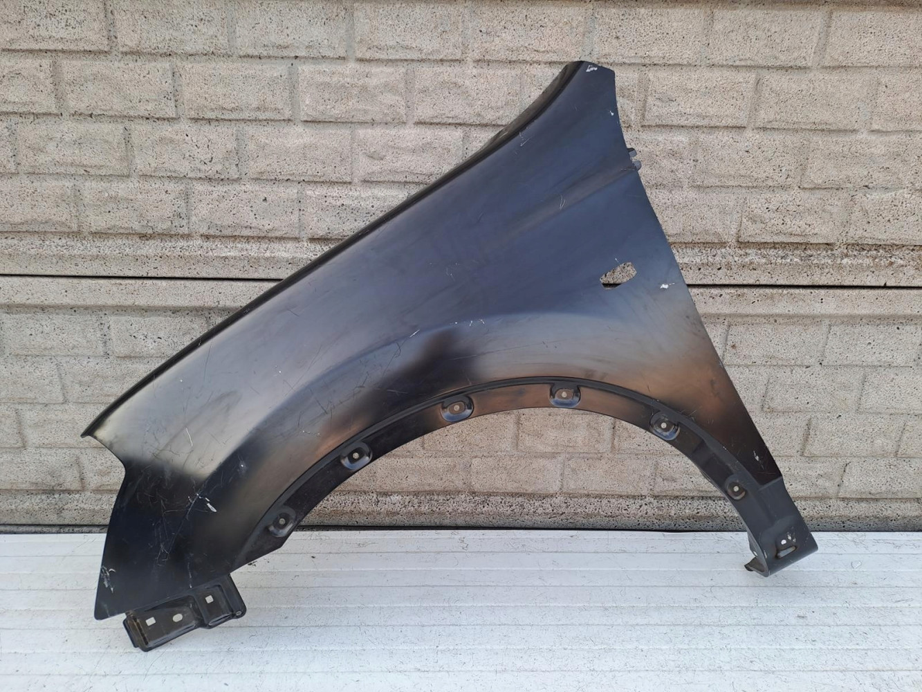 NISSAN QASHQAI 06-09 BŁOTNIK PRZEDNI LEWY NOWY - (13896611048)