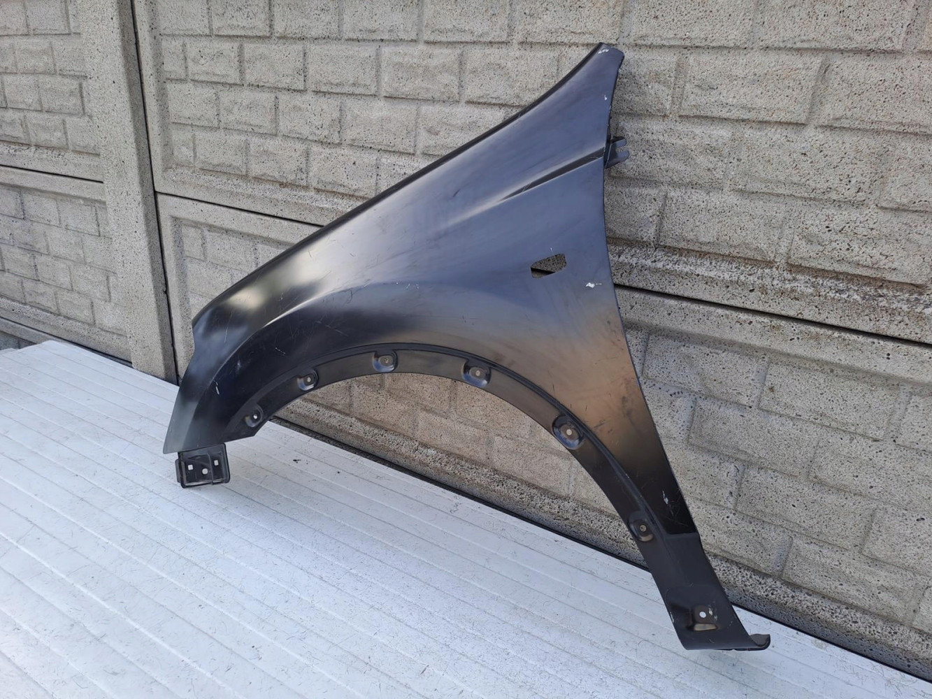 NISSAN QASHQAI 06-09 BŁOTNIK PRZEDNI LEWY NOWY - (13896611048)