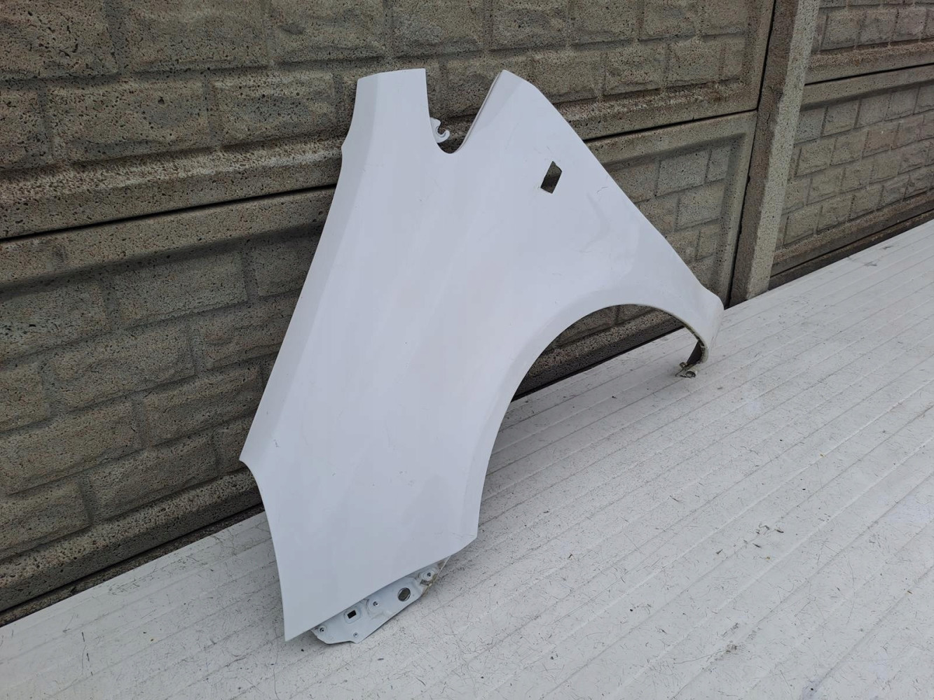 BŁOTNIK LEWY OPEL CORSA D 2006-2015 - (13938456696)
