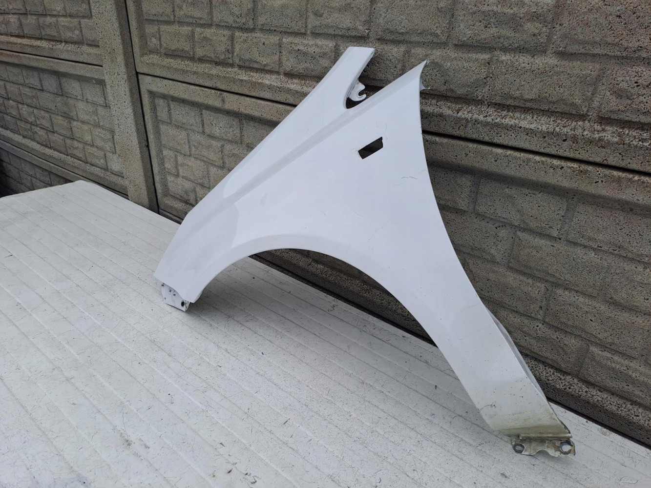 BŁOTNIK LEWY OPEL CORSA D 2006-2015 - (13938456696)