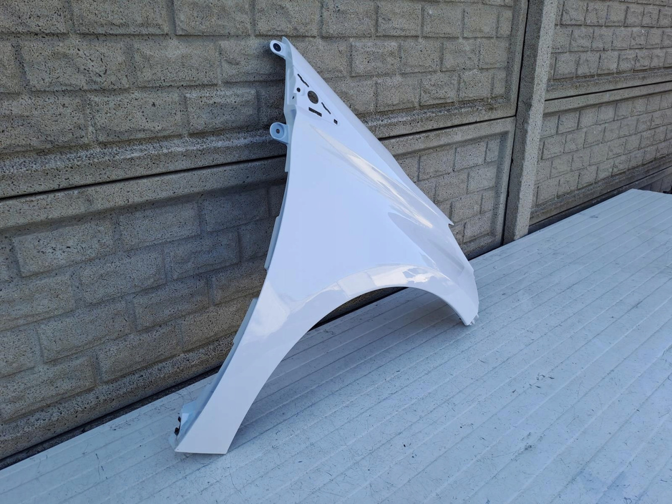 RENAULT ZOE BŁOTNIK PRAWY PRZEDNI - (13965276545)