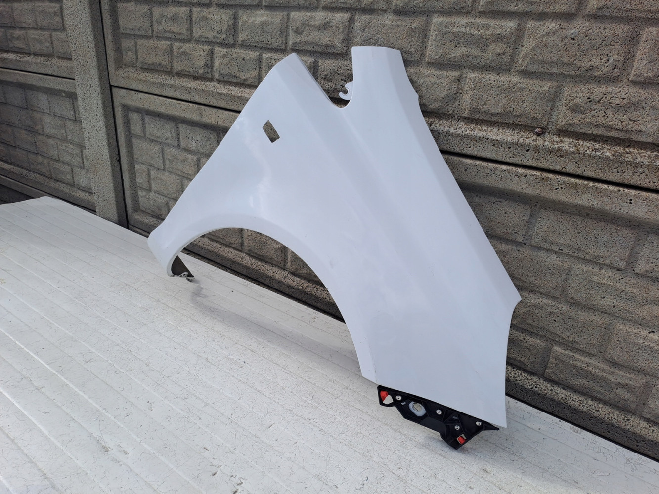 BŁOTNIK PRZEDNI PRAWY OPEL CORSA D 2006-2015 - (14128801836)