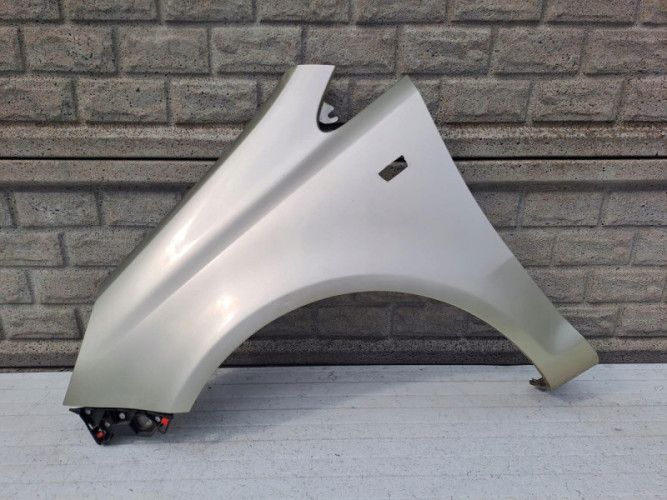 BŁOTNIK LEWY OPEL CORSA D 2006-2015 - (14286320212)