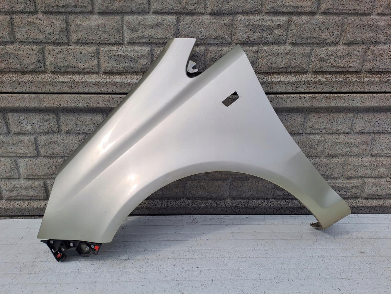 BŁOTNIK LEWY OPEL CORSA D 2006-2015 - (14286320212)