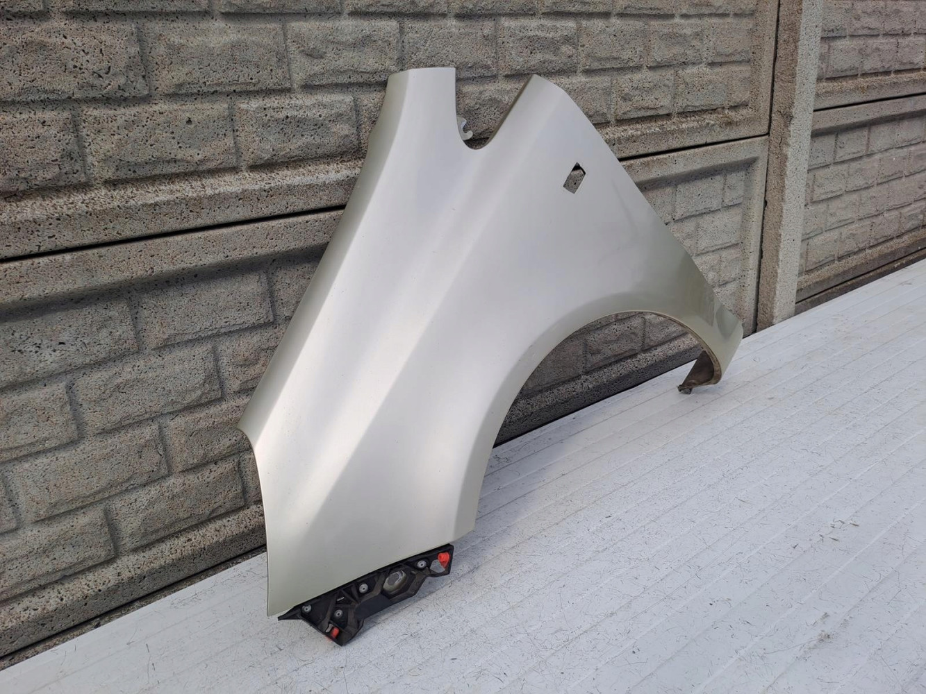 BŁOTNIK LEWY OPEL CORSA D 2006-2015 - (14286320212)