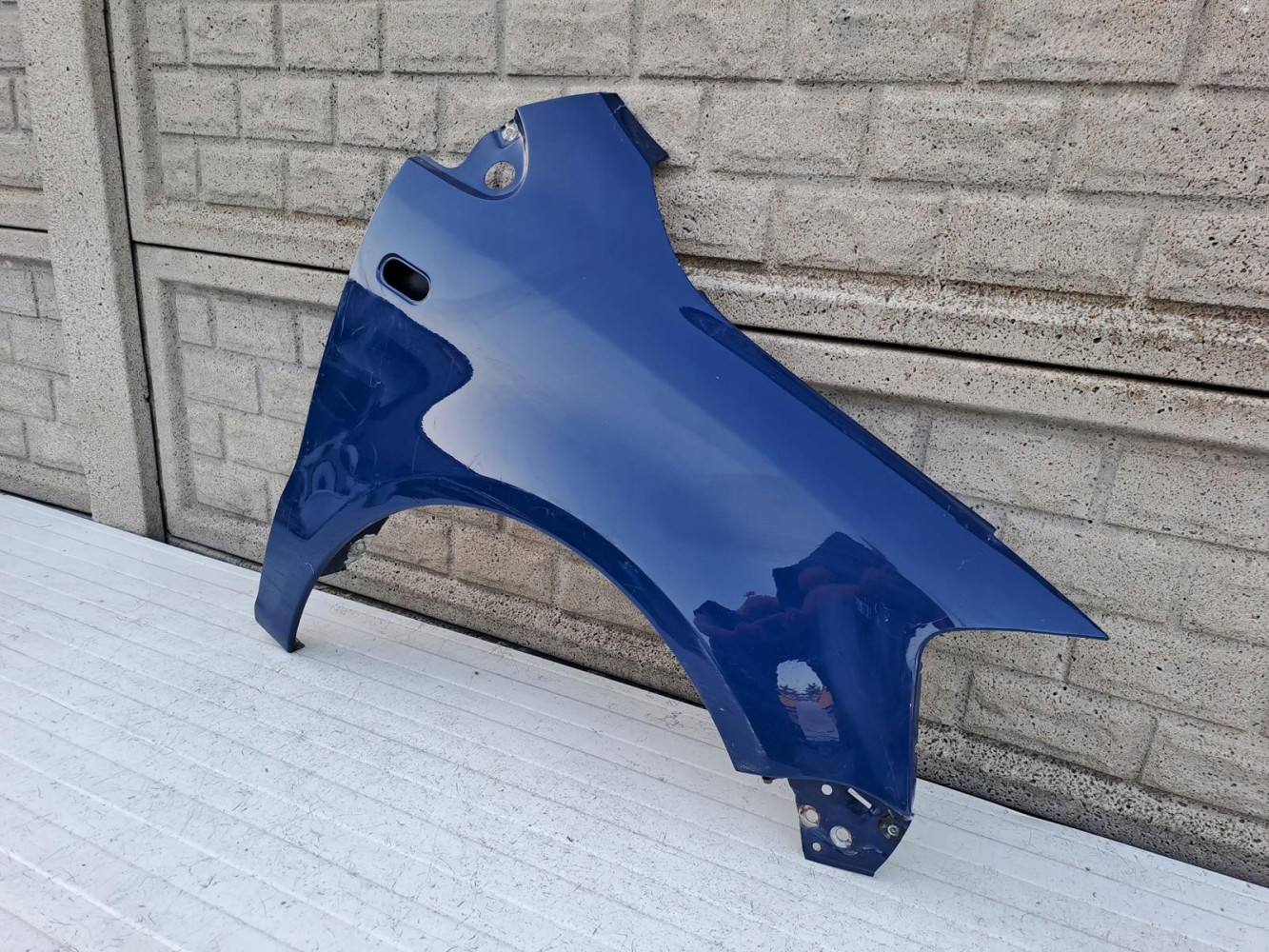 VW FOX 05-09 BŁOTNIK PRZEDNI PRAWY - (14302664608)