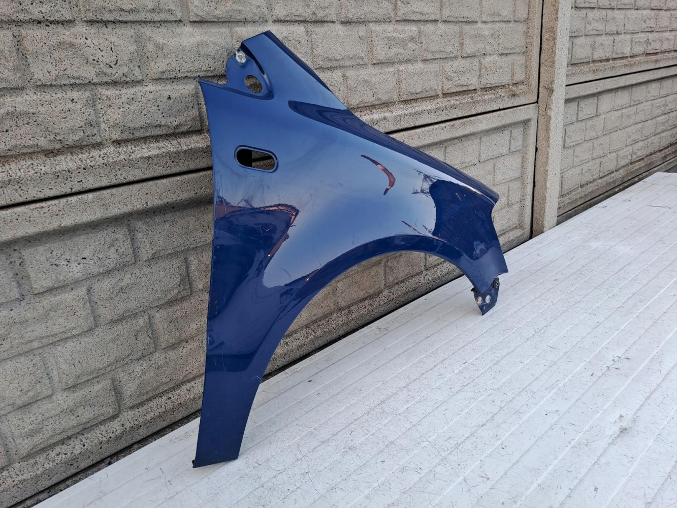 VW FOX 05-09 BŁOTNIK PRZEDNI PRAWY - (14302664608)