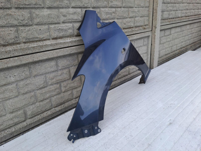 MAZDA 2 II 2007-2015 BŁOTNIK LEWY PRZEDNI - (14376003958)