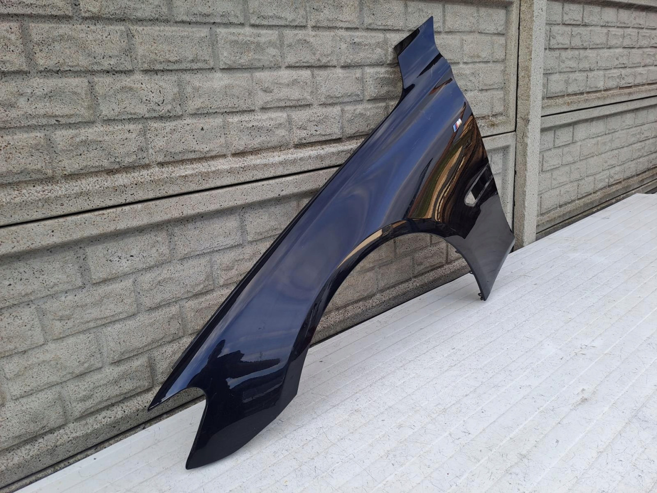 BMW VII 7 F01 F02 BŁOTNIK PRZEDNI LEWY - (14382721921)