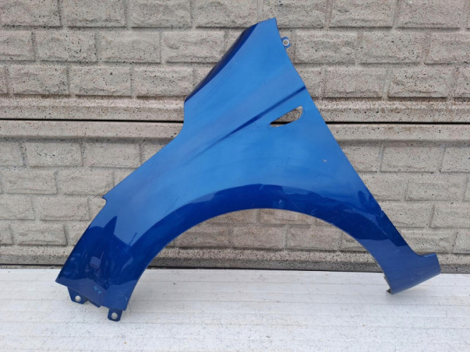 HYUNDAI I20 LIFT KIERUNEK BŁOTNIK PRZEDNI LEWY - (14383196287)