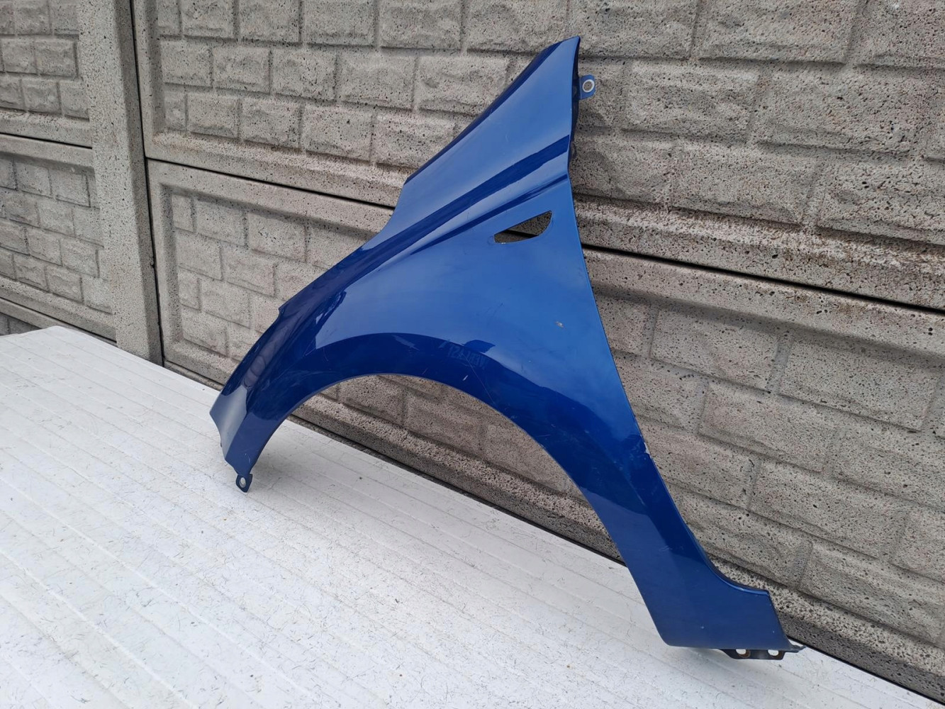 HYUNDAI I20 LIFT KIERUNEK BŁOTNIK PRZEDNI LEWY - (14383196287)