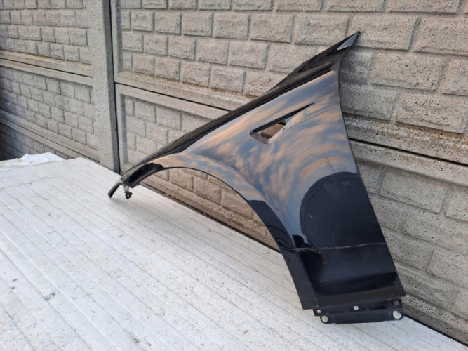 TESLA MODEL S BŁOTNIK LEWY PRZEDNI - (14854740544)