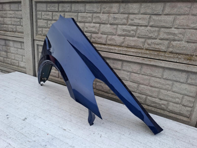 TESLA Y MODEL Y BŁOTNIK PRZEDNI PRAWY - (15009045498)
