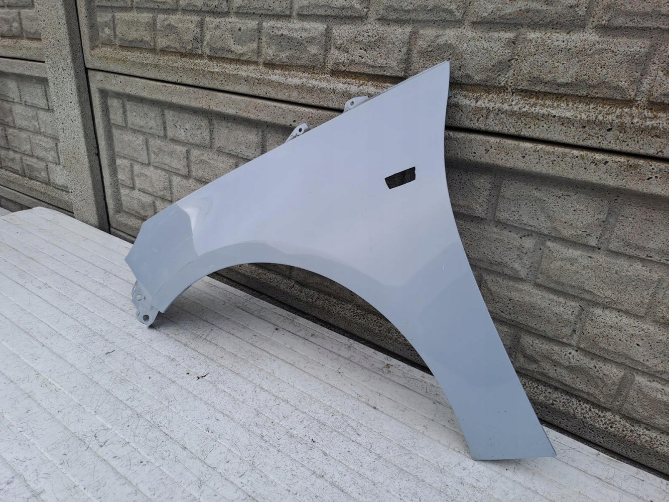 OPEL ADAM BŁOTNIK PRZEDNI LEWY - (15201336880)
