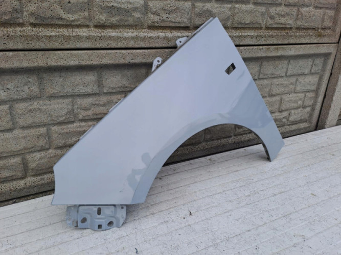 OPEL ADAM BŁOTNIK PRZEDNI LEWY - (15201336880)