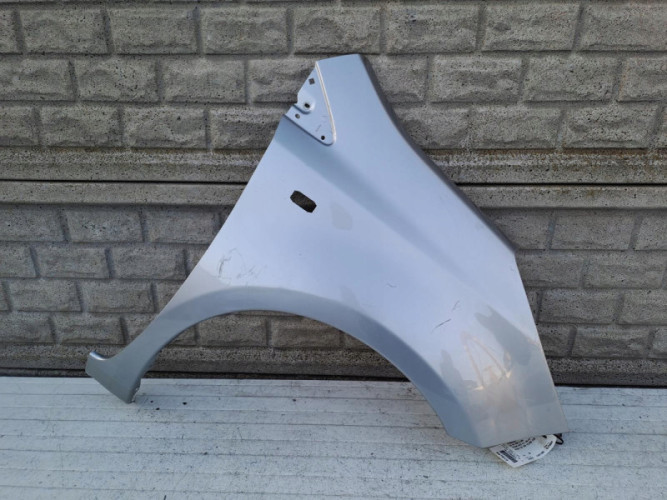 NISSAN NOTE 2006 - 2012 BŁOTNIK PRZEDNI PRAWY - (15218453703)