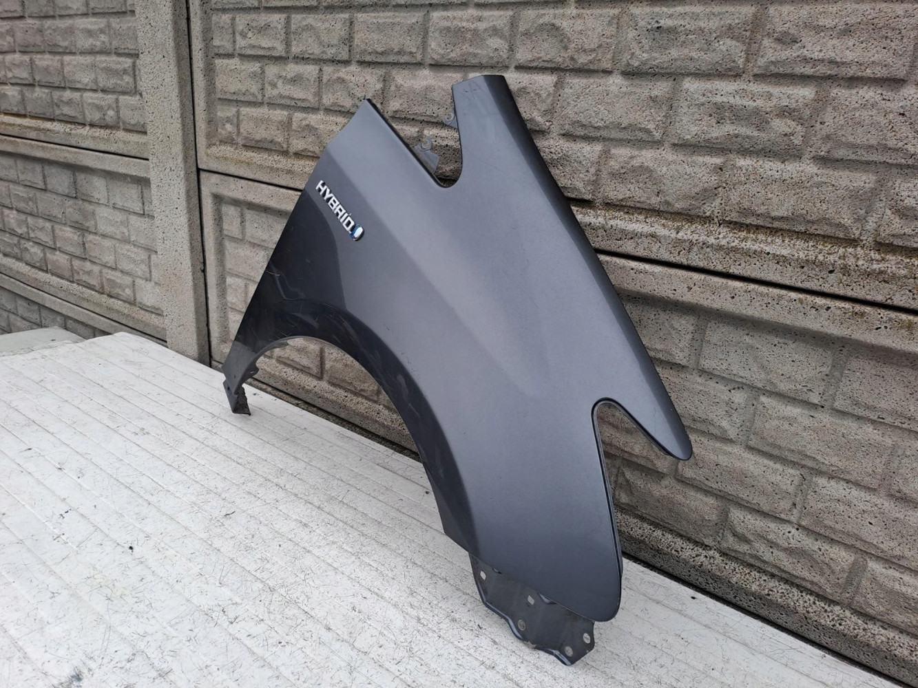 TOYOTA PRIUS PLUS BŁOTNIK PRZEDNI PRAWY - (15224500686)