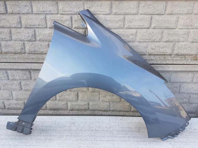 NISSAN LEAF II 17-22 BŁOTNIK PRZEDNI PRAWY