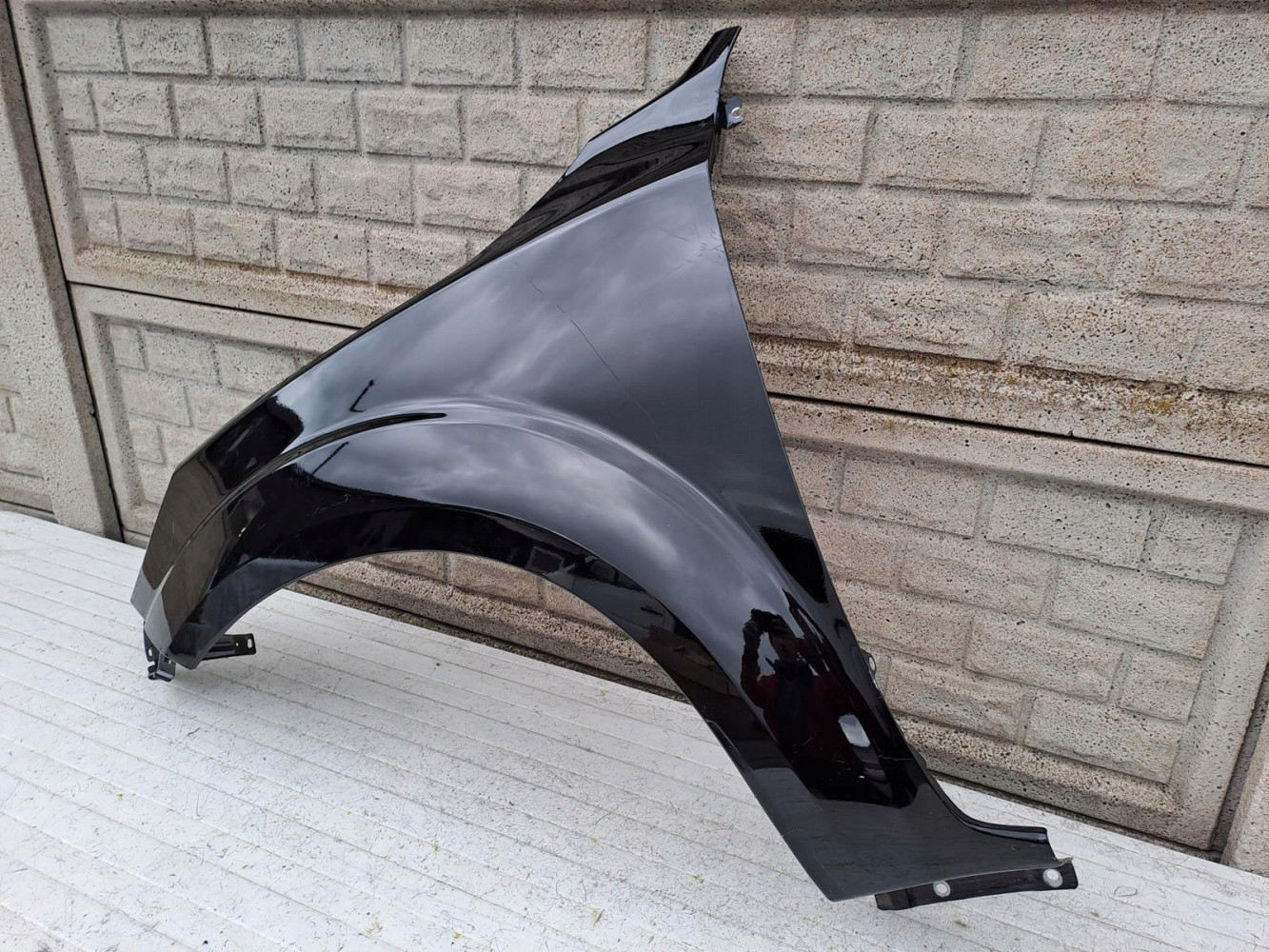 NISSAN NAVARA IV 16-24 BŁOTNIK PRZEDNI LEWY - (15417122880)