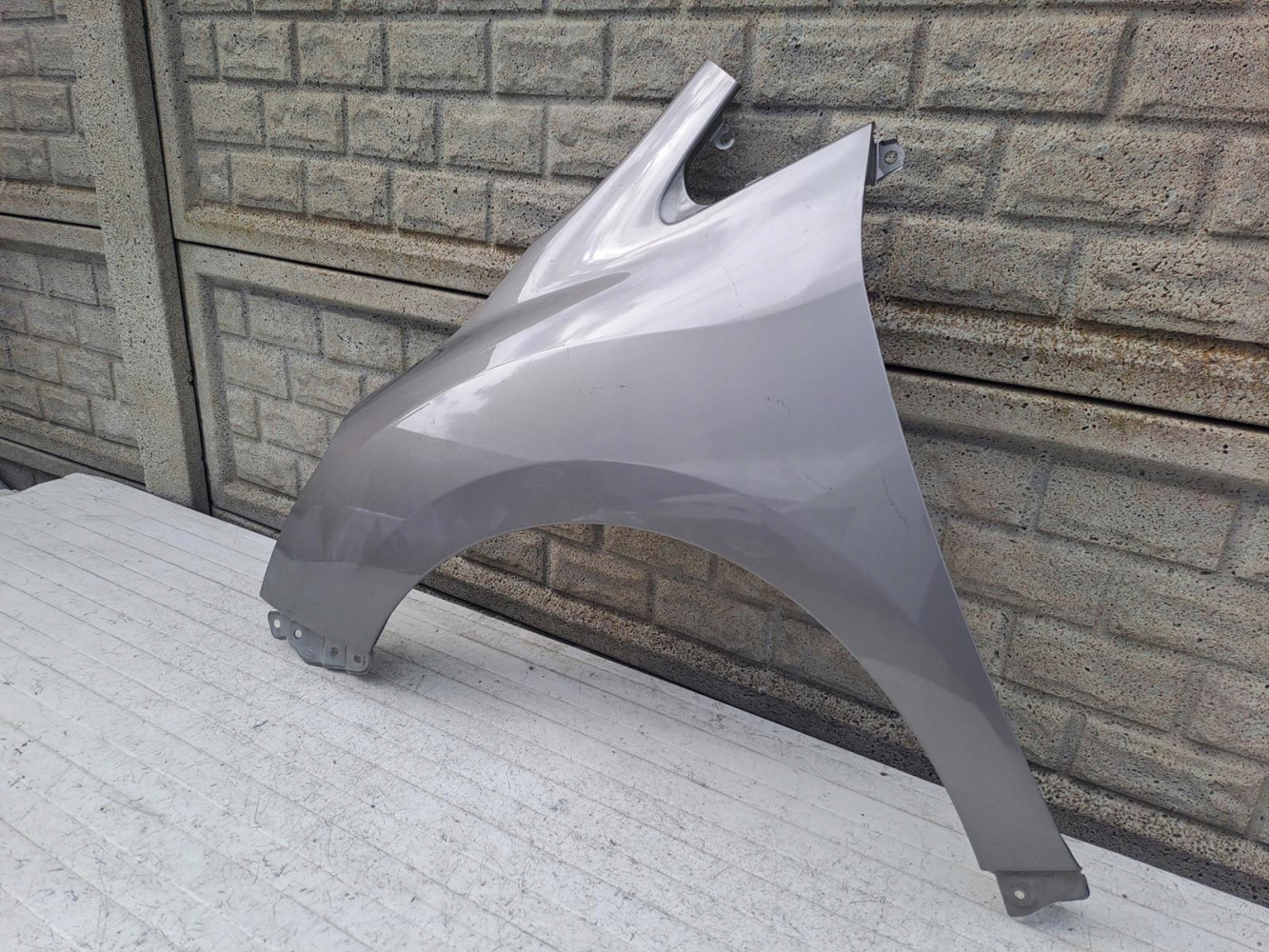 TOYOTA VERSO LIFT BŁOTNIK PRZEDNI LEWY - (15450338095)