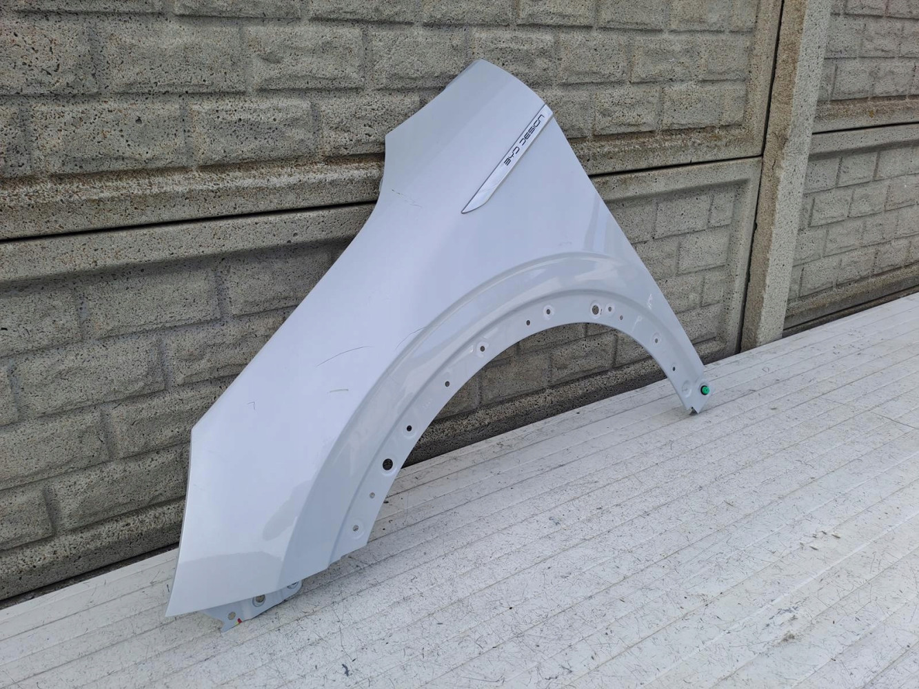 BYD ATTO 3 BŁOTNIK LEWY - (15485552103)